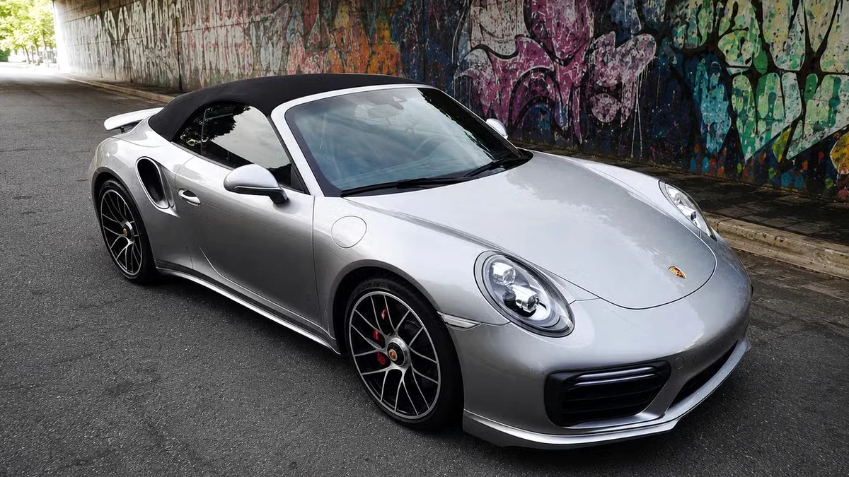 Front three-quarter view of the detailed silver Porsche 911 Turbo Cabriolet